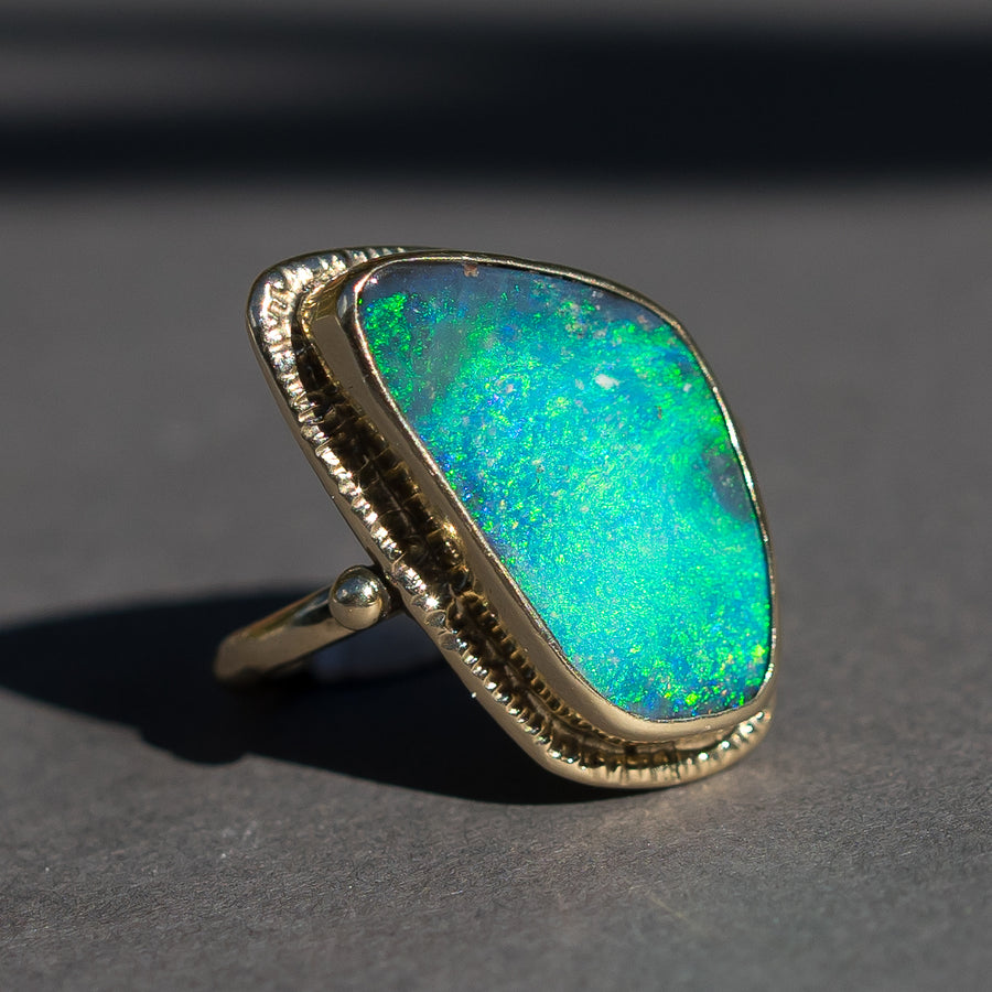 large blue boulder opal gold ring